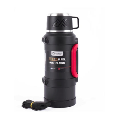 Termo acero inoxidable 2 litros negro con asa roja, tapa vaso y correa de transporte